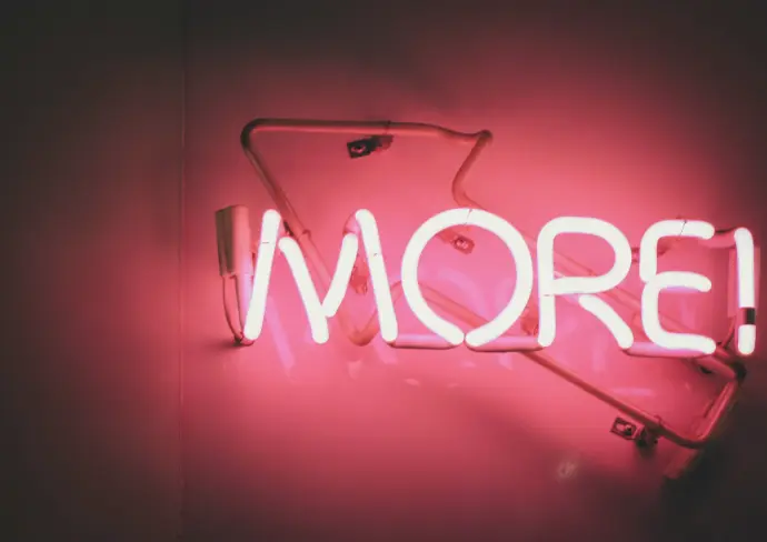 a neon sign that says more on it